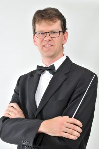 Musical Director and Conductor of the Rand Symphony Orchestra, Carl Henn