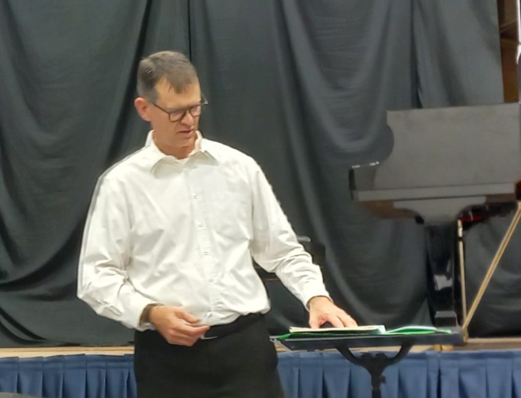 Carel studying the score of one of the works we're rehearsing
